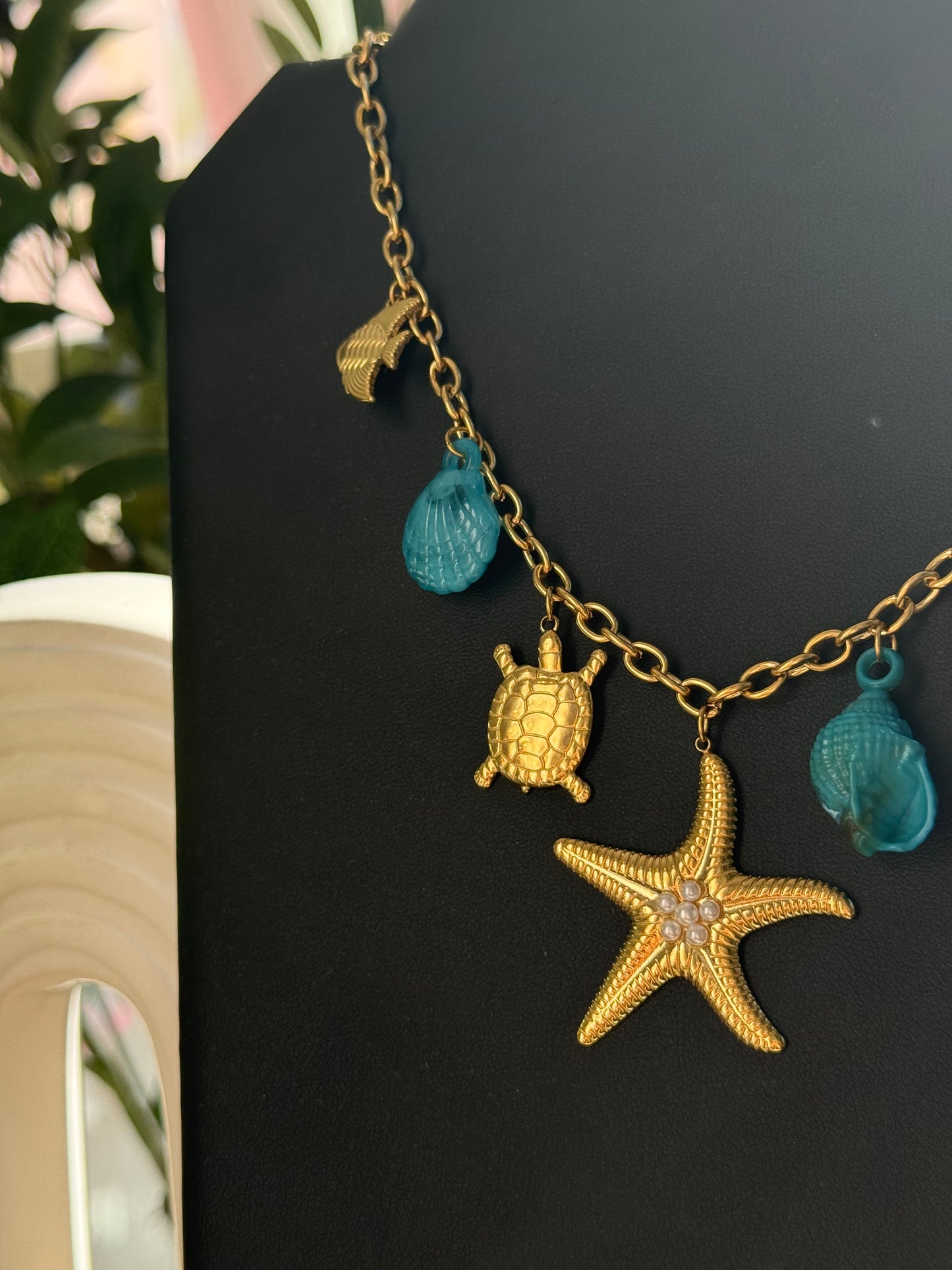 Collier breloques coquillage