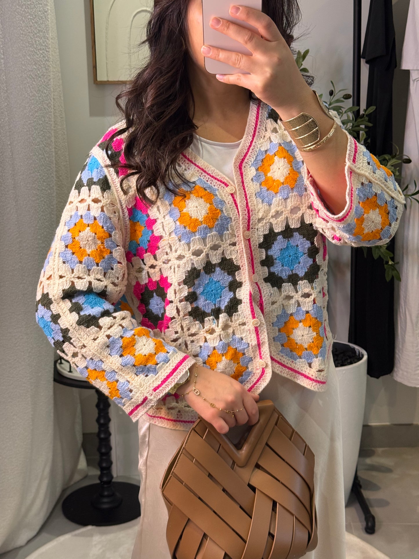 Gilet en crochet rose